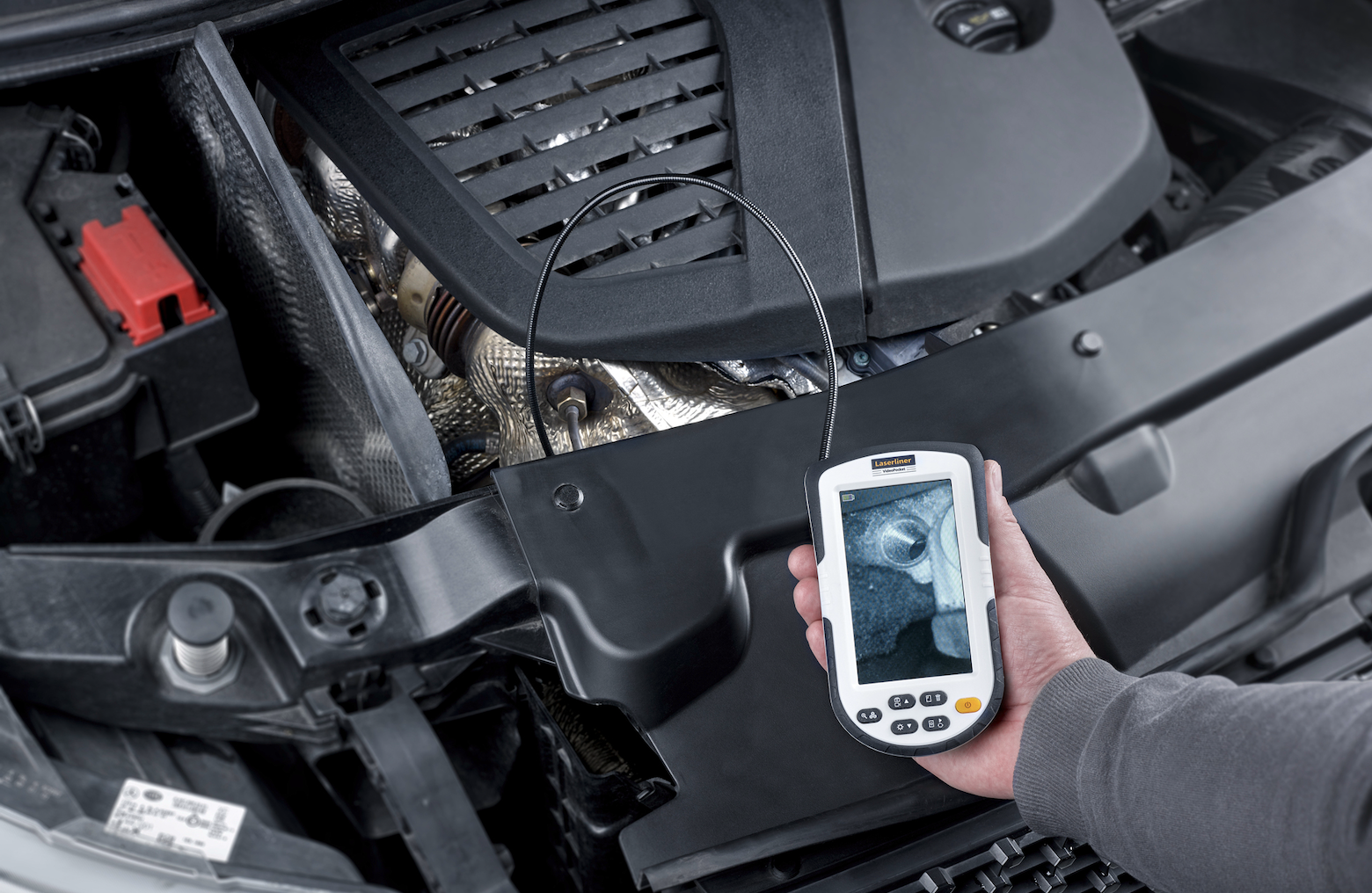 Laserliner Endoscope in use in automotive garage